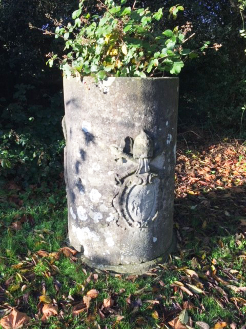 A cylindrical stone well head, H.4ft 3in. Diameter 2ft 7in.